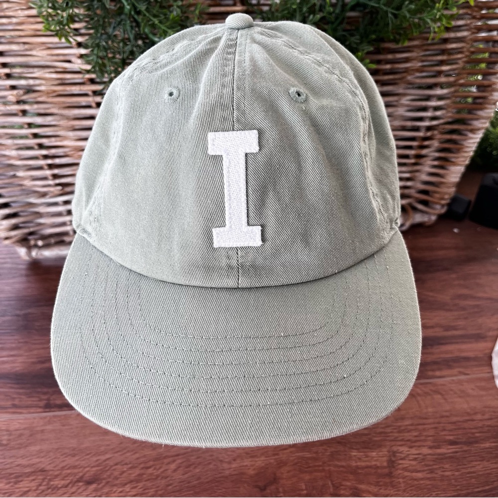 Rey to Z green hat with the letter I